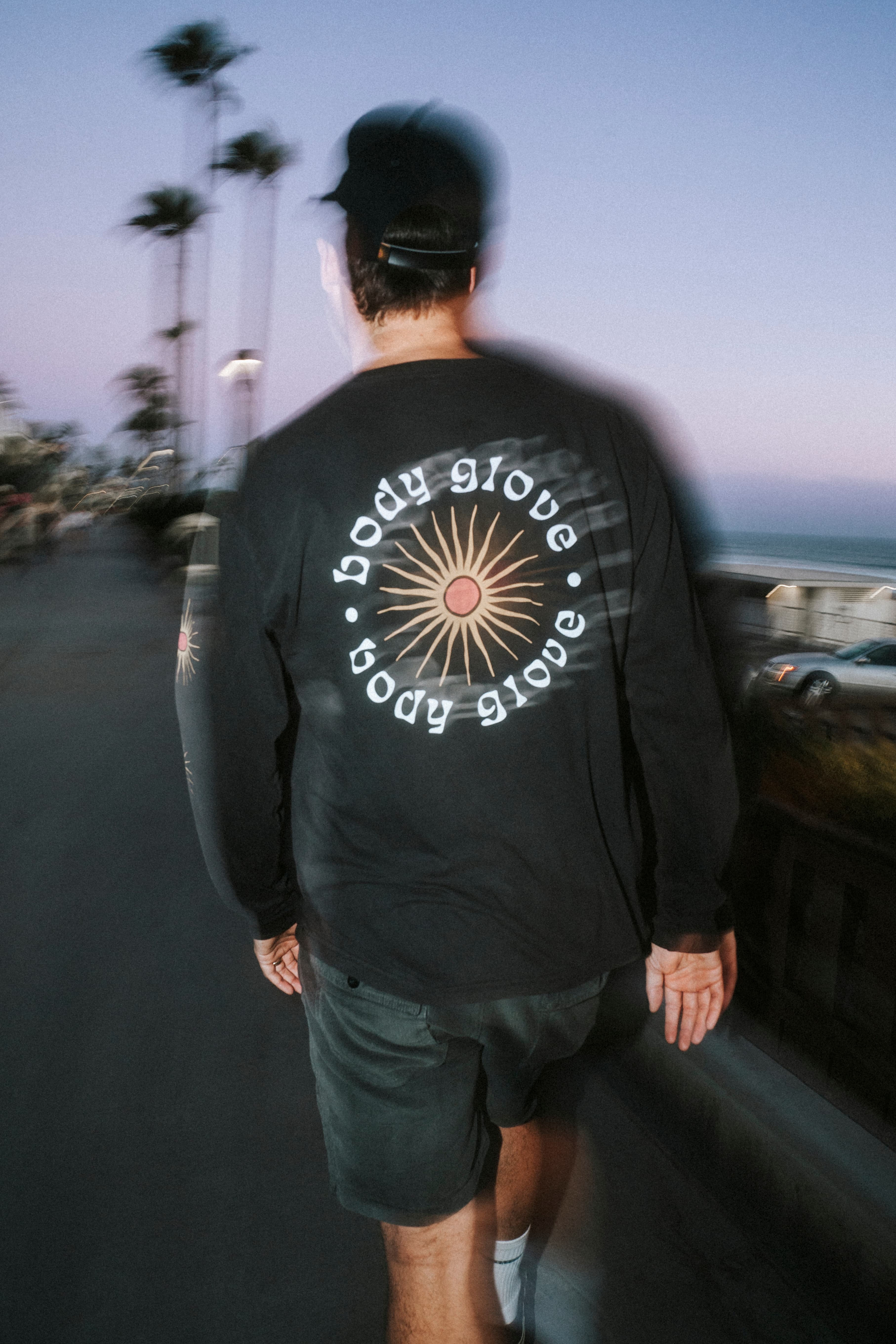 Printed long-sleeve tee shown as a custom apparel option