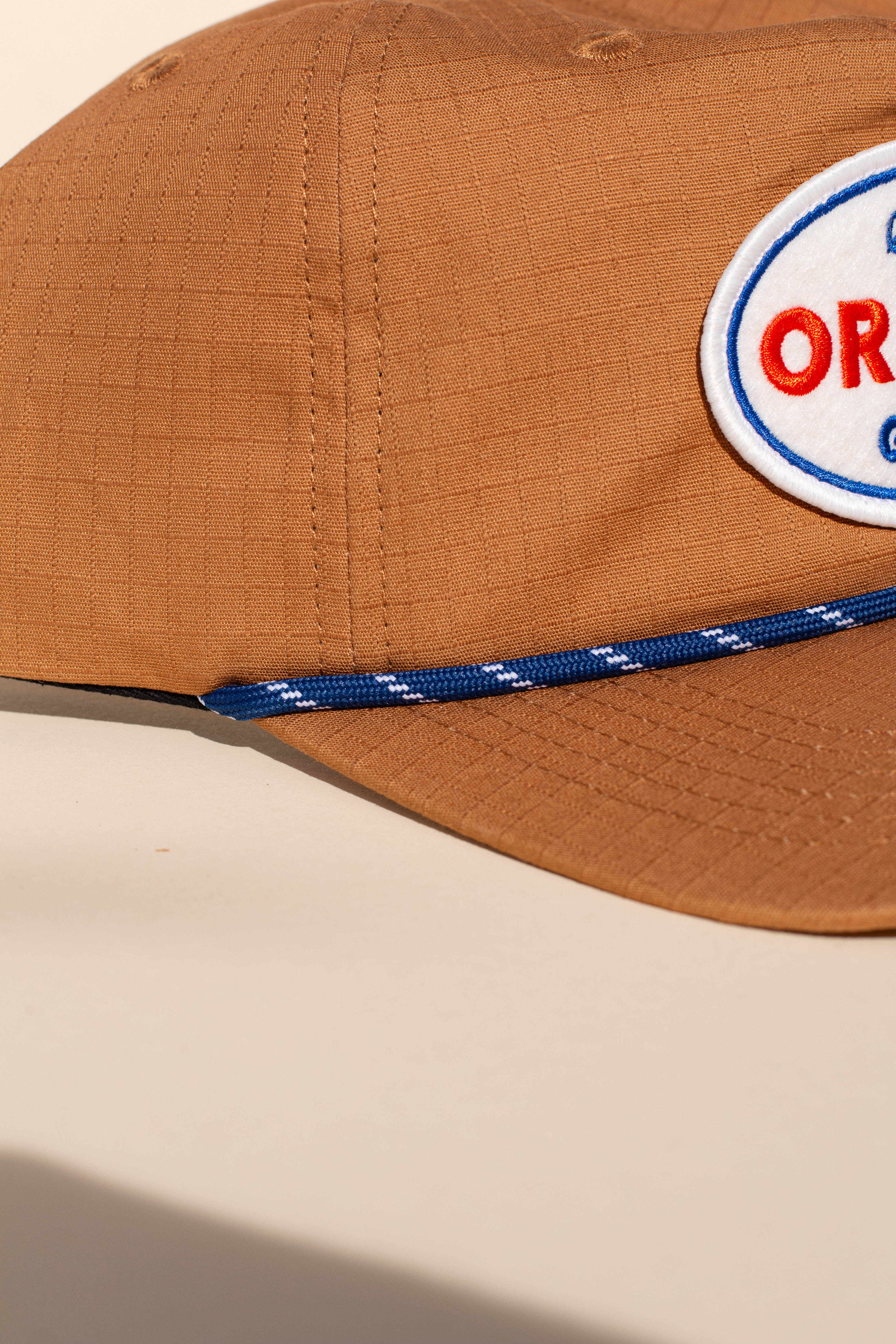 Custom hat with a brim rope add-on