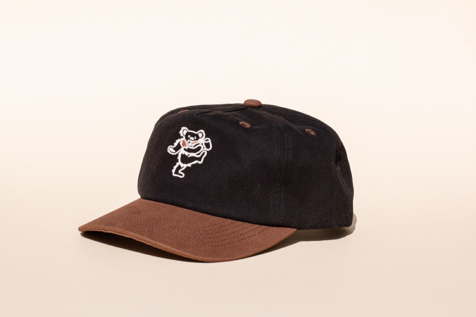 Interior woven label and seam tape detail inside a custom hat