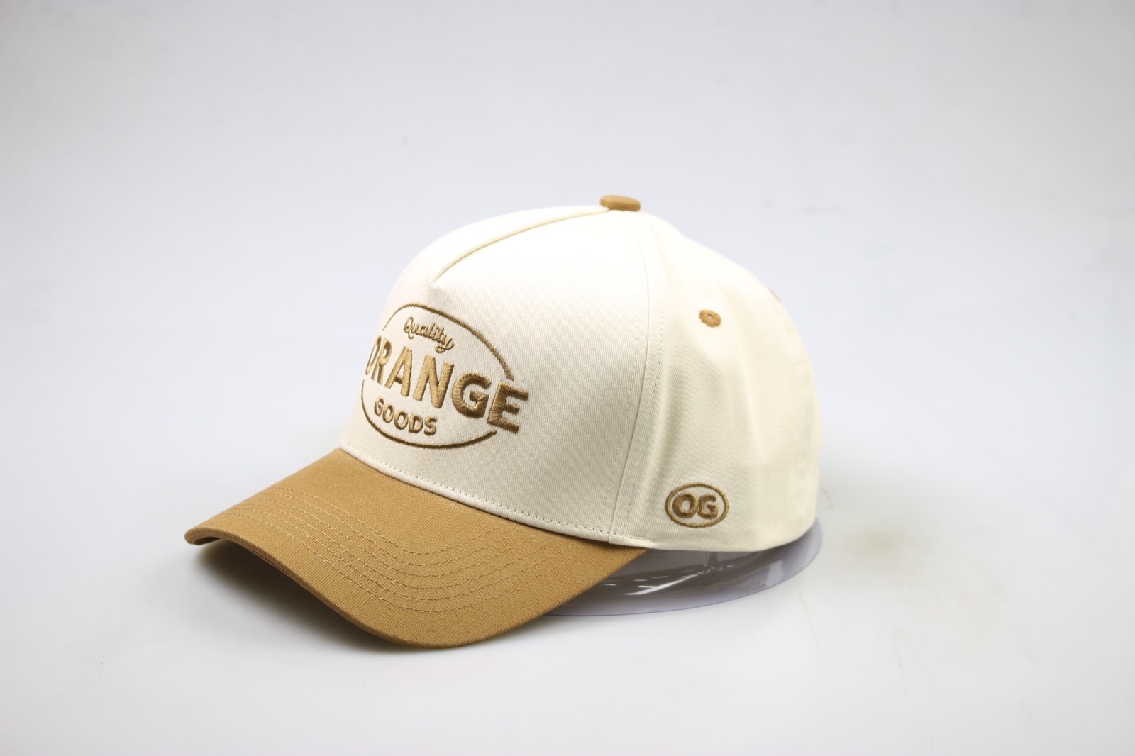 Raised embroidery detail on a structured hat